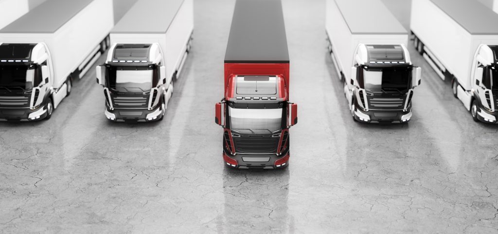 Fleet of trucks with cargo trailers. Transport, shipping industry.